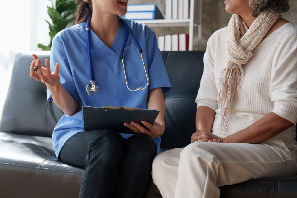 Home healthcare nurse, physical therapy with senior adult woman at home